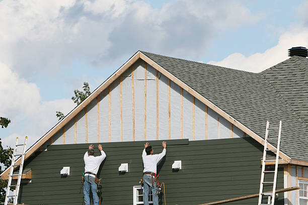 Professional Vinyl Siding technician working in White Hall, MD